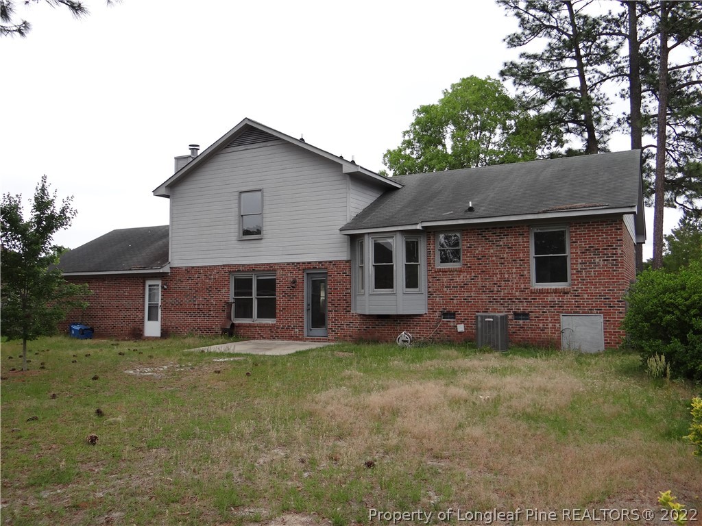 1810 Nuthatch Road Fayetteville, NC 28304 - Photo 36 of 37 front view of a house with a yard