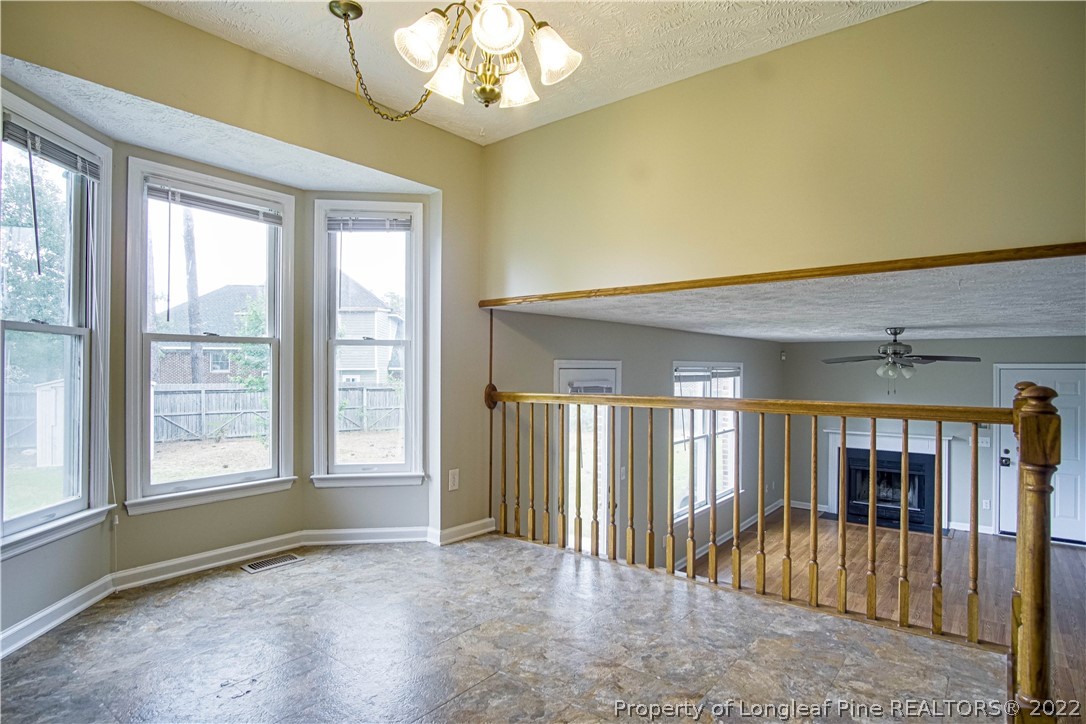 1810 Nuthatch Road Fayetteville, NC 28304 - Photo 5 of 37 a view of an empty room with a window
