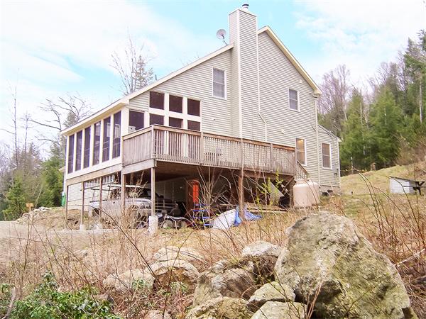 93 Lower Pomeroy Road Montgomery, MA 01085 - Photo 1 of 20 a view of a house with a yard