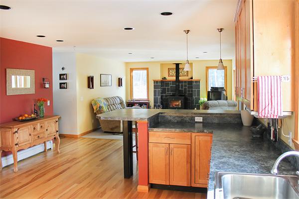 93 Lower Pomeroy Road Montgomery, MA 01085 - Photo 11 of 20 a living room with furniture and a fireplace