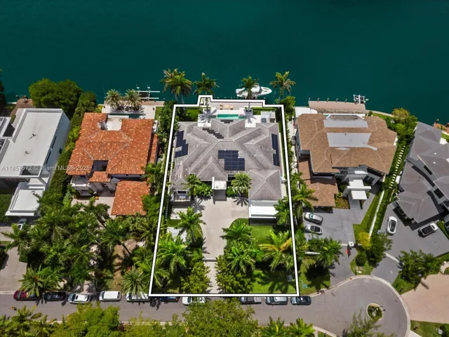 a bedroom with furniture and a flat screen tv