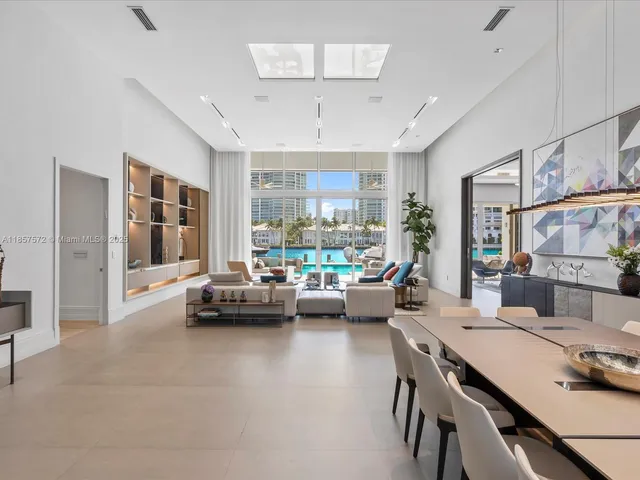 a bed room with a bed and a chair