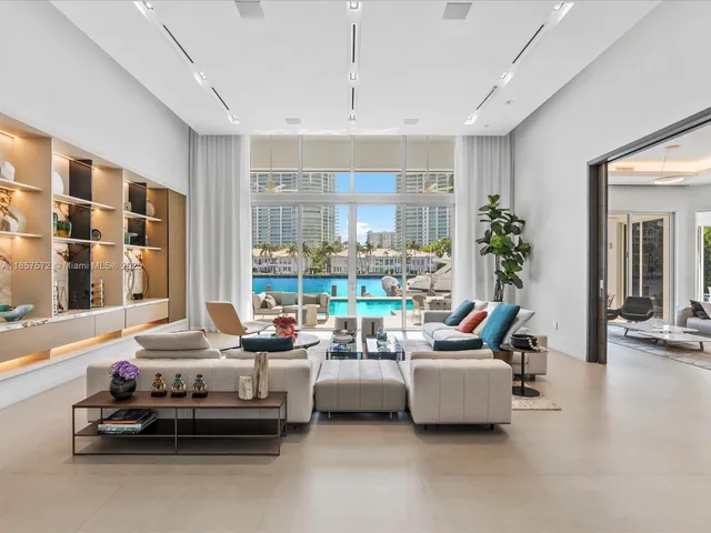 a bathroom with a shower sink and mirror