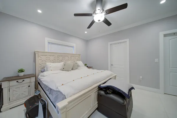 a bathroom with a toilet a sink and shower