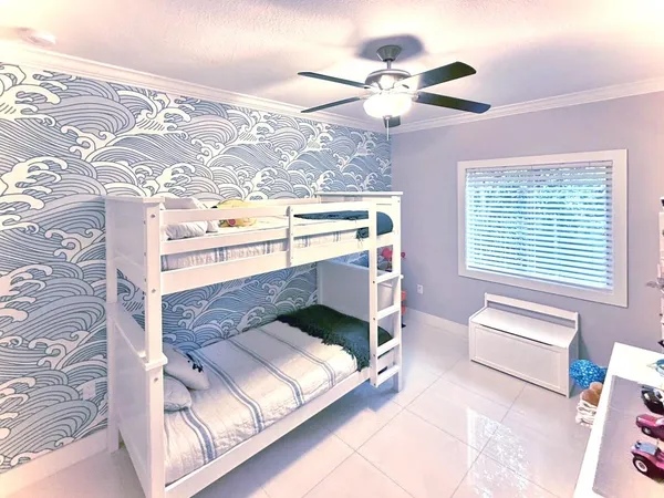 a bathroom with a bathtub toilet and shower