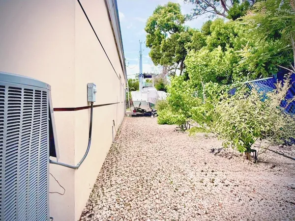 a backyard of a house with lots of green space