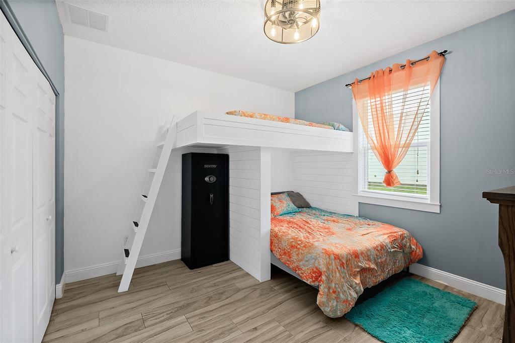 4895 State Rte 100 Bunnell, FL 32110 - Photo 29 of 45 a bedroom with a bed and a window