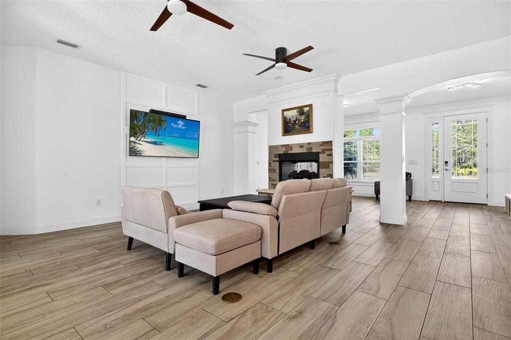 4895 State Rte 100 Bunnell, FL 32110 - Photo 10 of 45 a living room with furniture and a flat screen tv