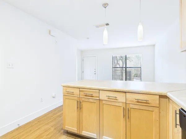 a view of kitchen with wooden floor