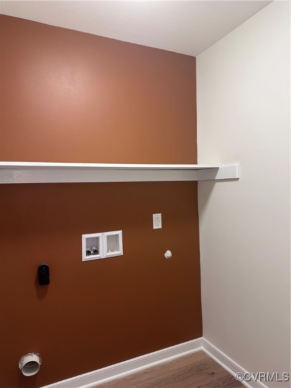 20 Hillcrest Road Petersburg, VA 23805 - Photo 15 of 22 Laundry room featuring LVP flooring and shelving.