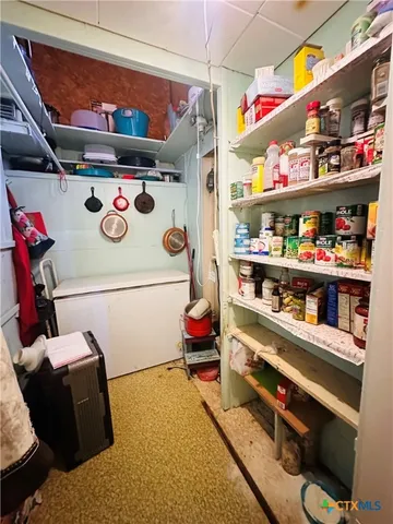 a room with storage and utility