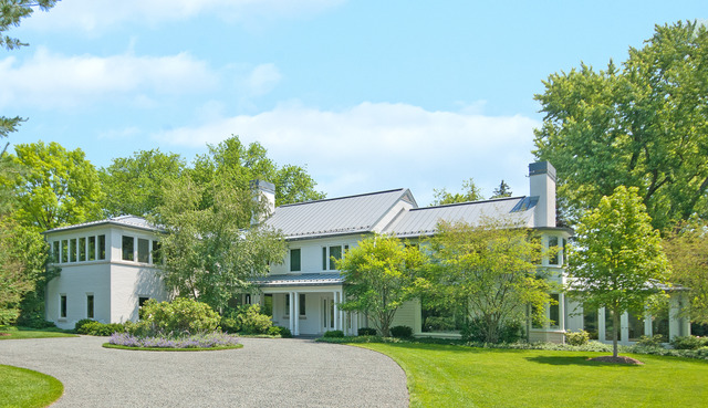 11 Woodley Road Winnetka, IL 60093 - Photo 1 of 1 a front view of a house with garden