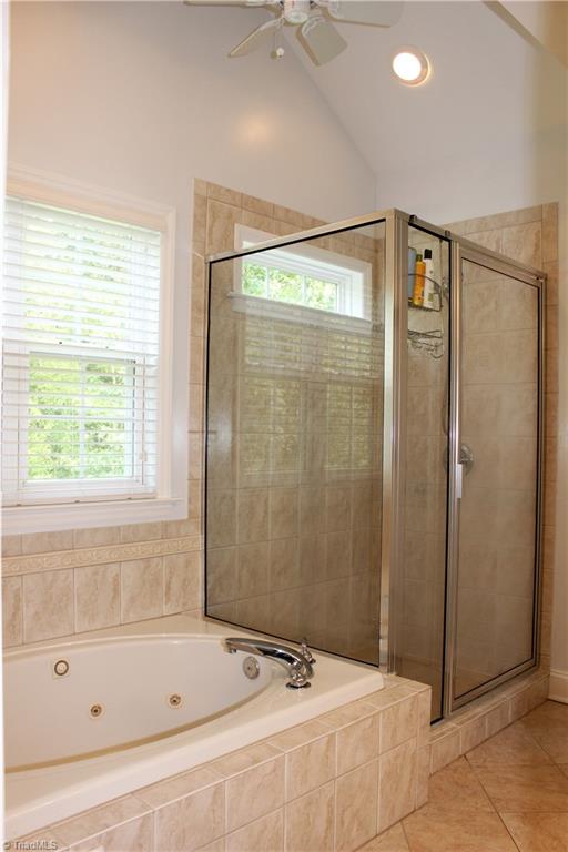 7820 Wilson Farm Road Summerfield, NC 27358 - Photo 16 of 29 Jetted Tub & Separate Shower! Linen closet too!