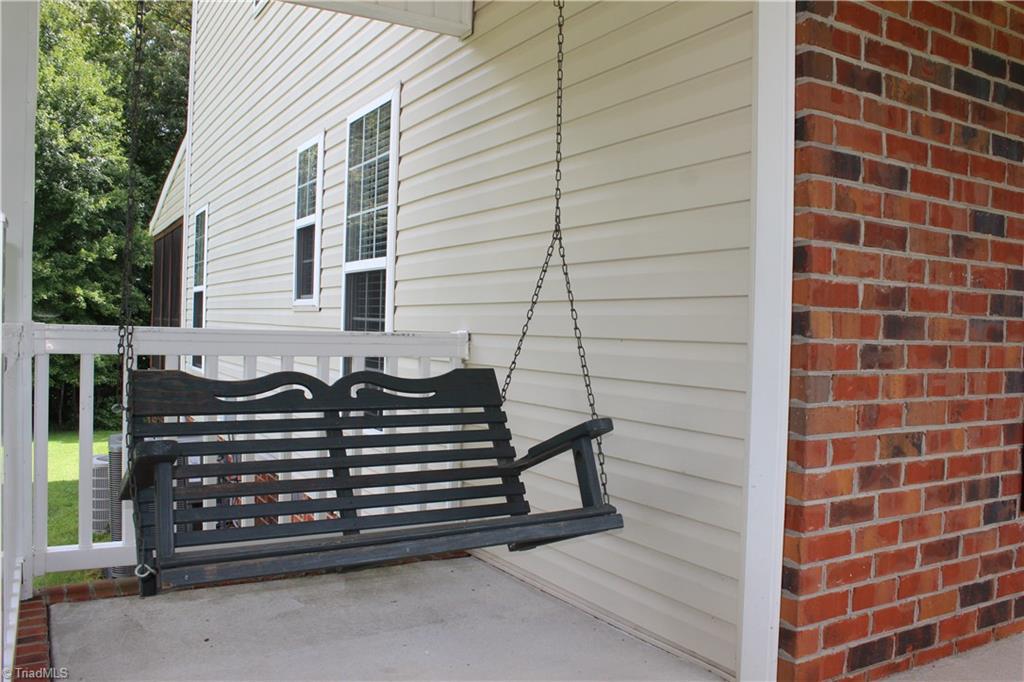 7820 Wilson Farm Road Summerfield, NC 27358 - Photo 3 of 29 Swing, Relax, Read a Book, Feel the Breeze!