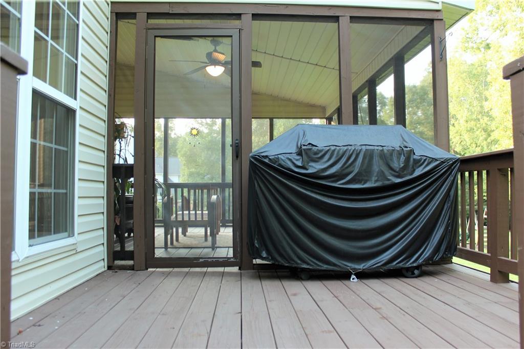 7820 Wilson Farm Road Summerfield, NC 27358 - Photo 25 of 29 The Separate Deck area is perfect for your Happy Grill Master!