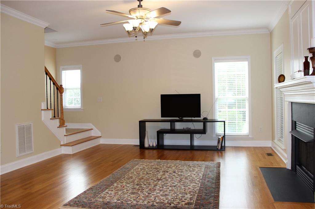 7820 Wilson Farm Road Summerfield, NC 27358 - Photo 7 of 29 Great Room offers Natural Light and Hardwood Floors and opens to Kitchen!