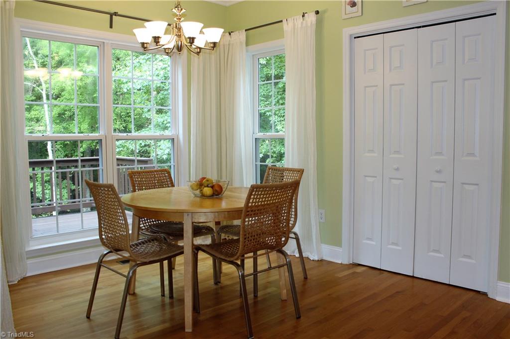 7820 Wilson Farm Road Summerfield, NC 27358 - Photo 9 of 29 Breakfast area has a great view of the backyard! Large Pantry will surely help with your kitchen items!