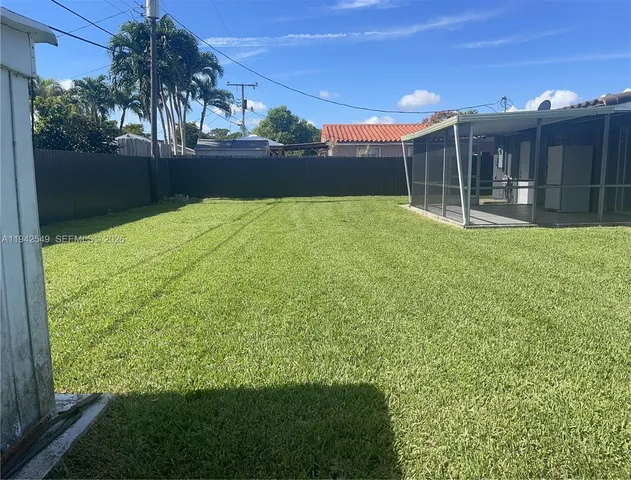 a house view with a garden space