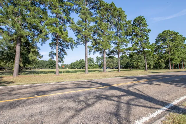 a view of a playground with basketball court