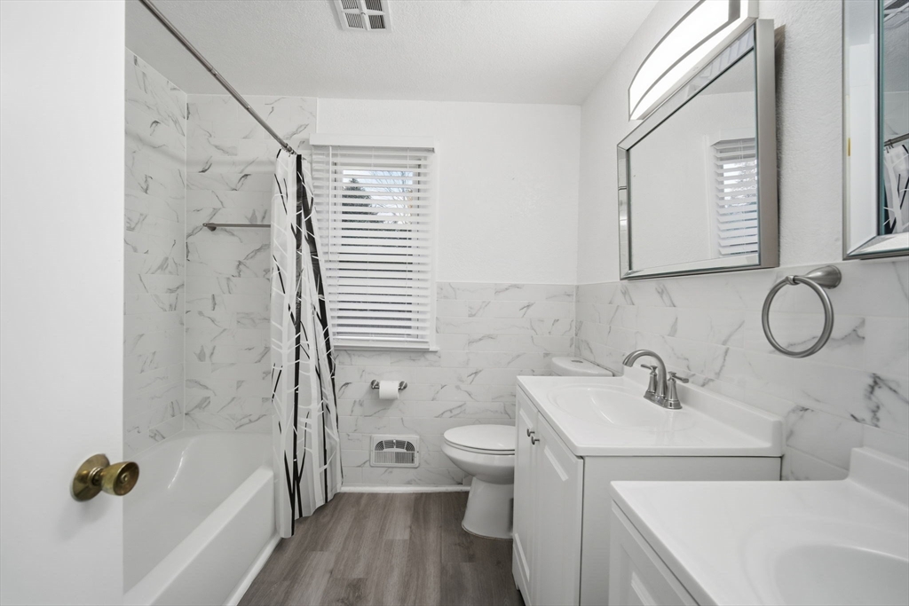 181 Beauchamp Terrace Chicopee, MA 01020 - Photo 18 of 36 a bathroom with a sink toilet and shower