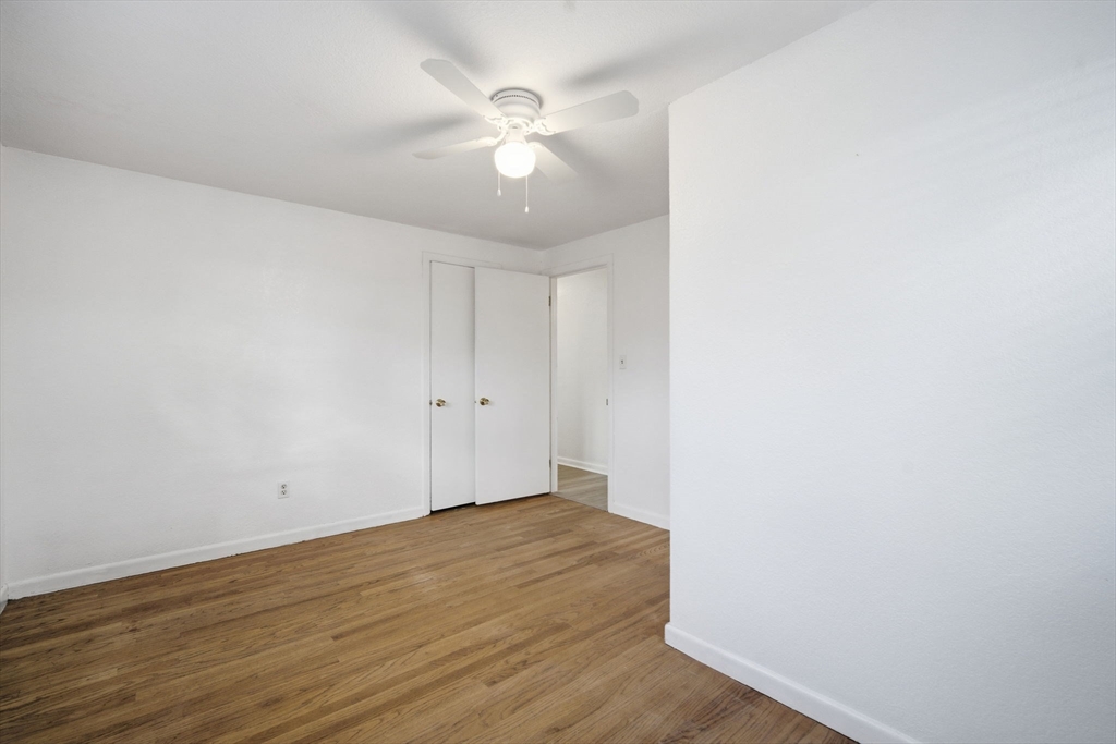 181 Beauchamp Terrace Chicopee, MA 01020 - Photo 20 of 36 a view of an empty room with wooden floor