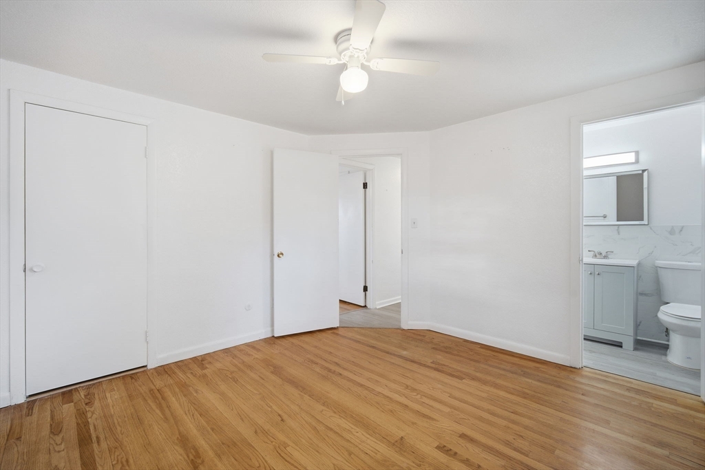 181 Beauchamp Terrace Chicopee, MA 01020 - Photo 23 of 36 a view of empty room with wooden floor and fan