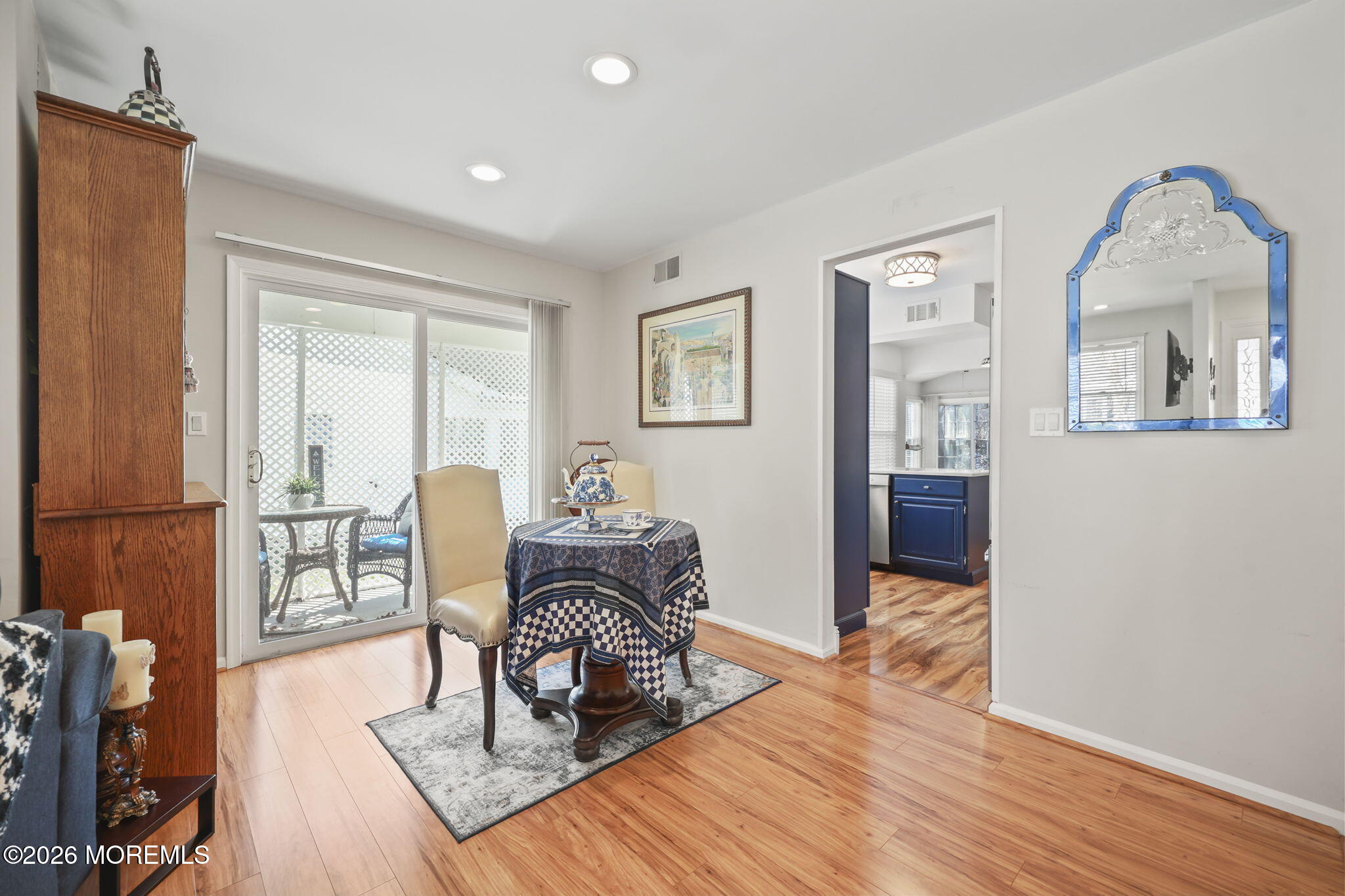 2254 Beltane Road Toms River, NJ 08755 - Photo 15 of 44 a living room with furniture a table and a large window