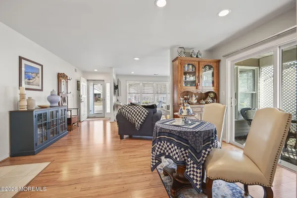 a kitchen with stainless steel appliances granite countertop counter space a sink cabinets and wooden floor