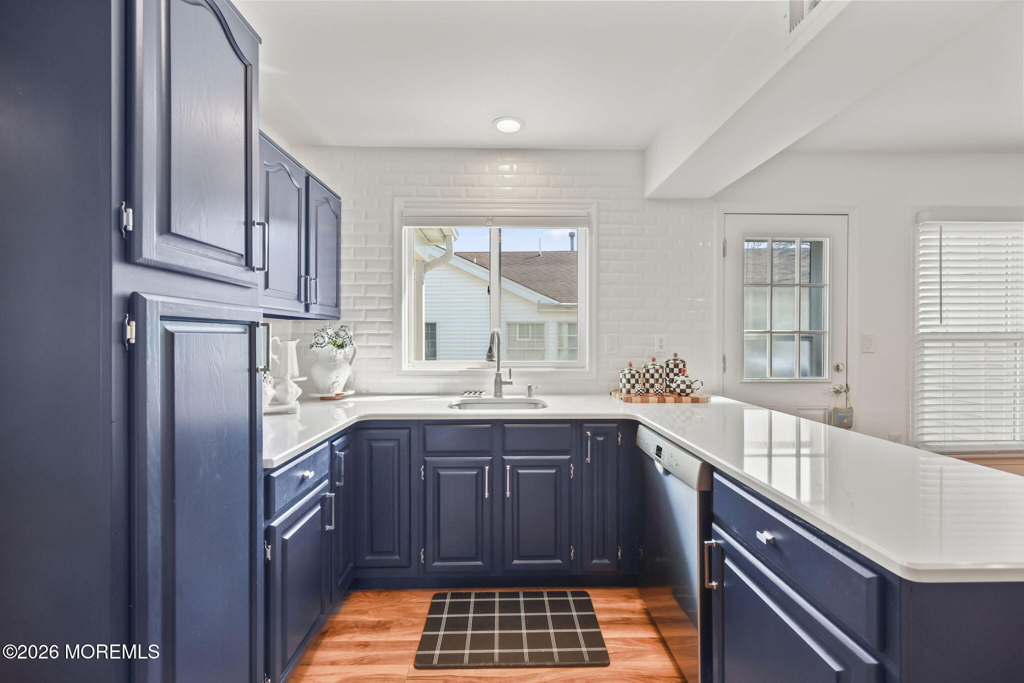 2254 Beltane Road Toms River, NJ 08755 - Photo 18 of 44 a kitchen with a sink stove and cabinets