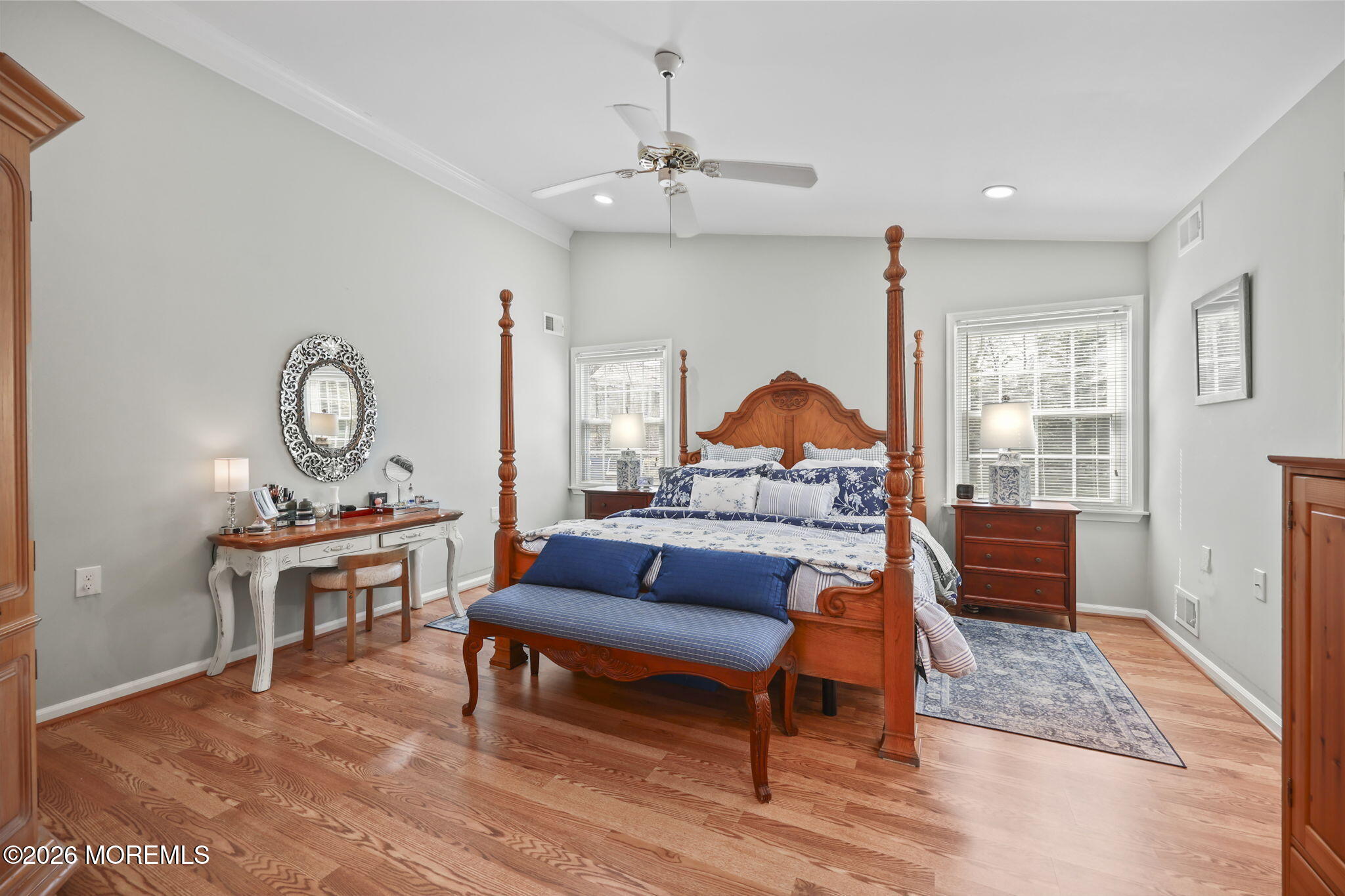 2254 Beltane Road Toms River, NJ 08755 - Photo 26 of 44 a living room with furniture a rug and a chandelier