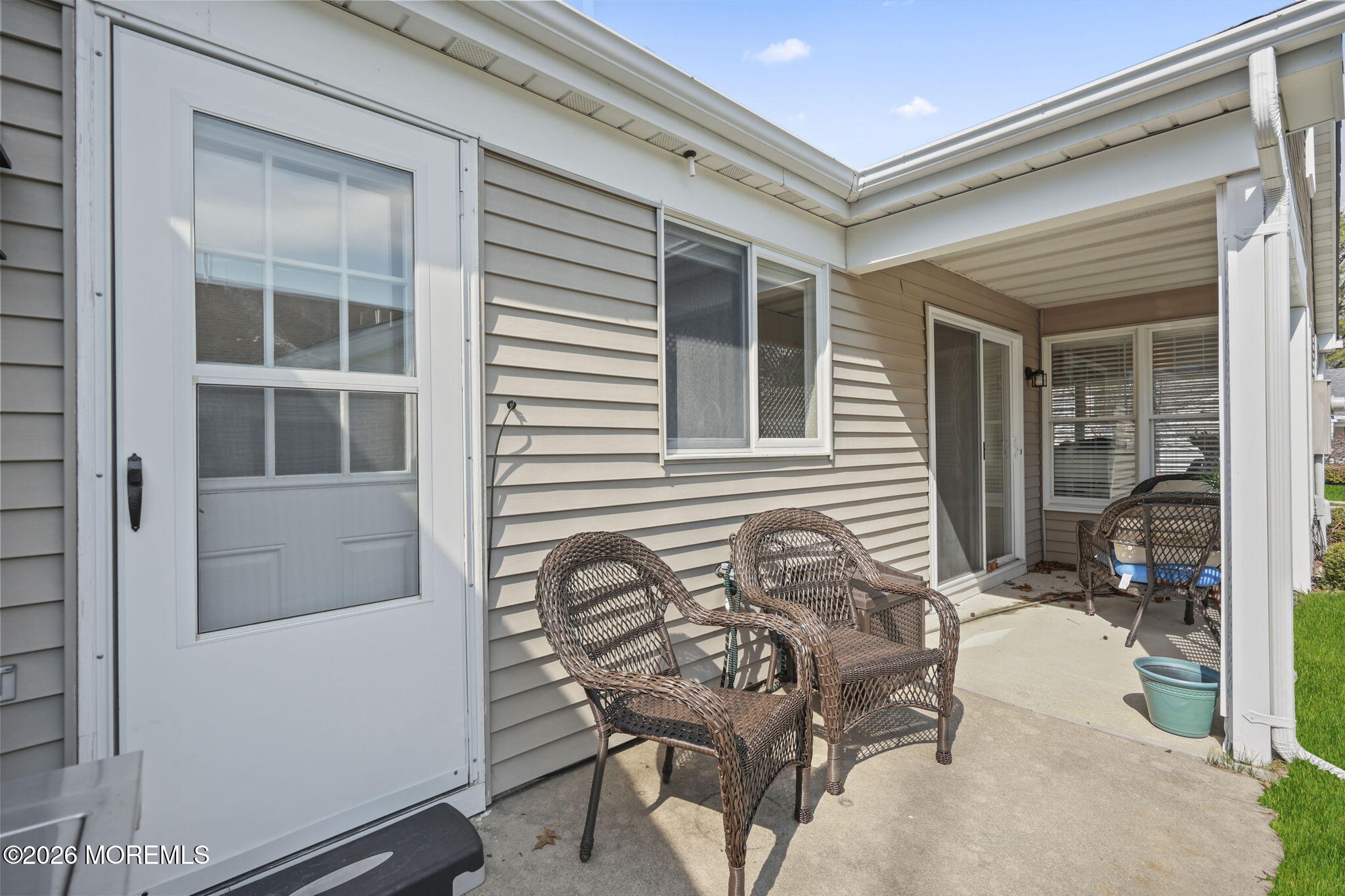 2254 Beltane Road Toms River, NJ 08755 - Photo 36 of 44 a balcony with table and chairs