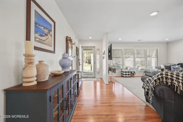 a living room with furniture and a table