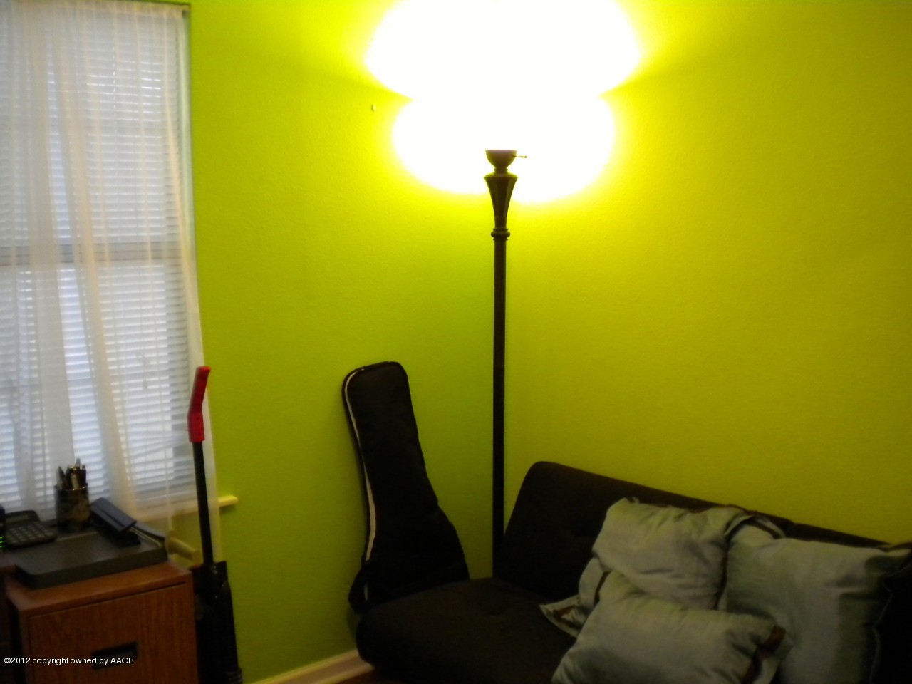 4224 South Harrison Street Amarillo, TX 79110 - Photo 14 of 15 a view of a room with furniture and a window