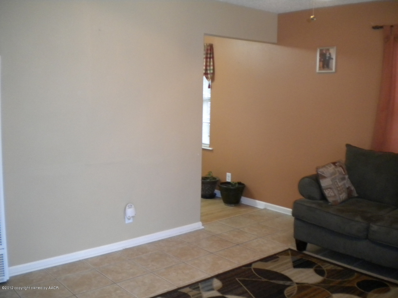 4224 South Harrison Street Amarillo, TX 79110 - Photo 3 of 15 a living room with furniture and a rug