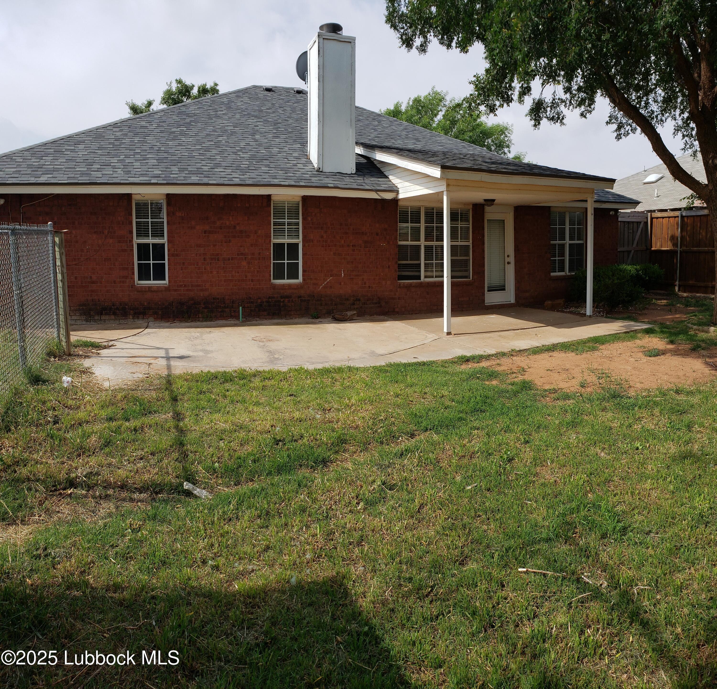 6220 7th Street Lubbock, TX 79416 - Photo 16 of 28 a house view with a garden space