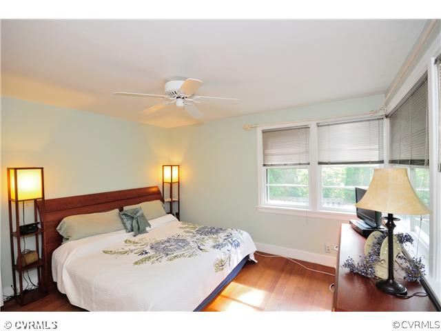 8302 Cherokee Road Richmond, VA 23235 - Photo 14 of 24 Master Bedroom - The master bedroom has hardwood f
