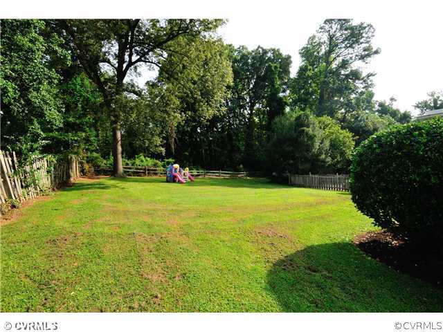 8302 Cherokee Road Richmond, VA 23235 - Photo 23 of 24 Exterior Back - The expansive back yard is fully f
