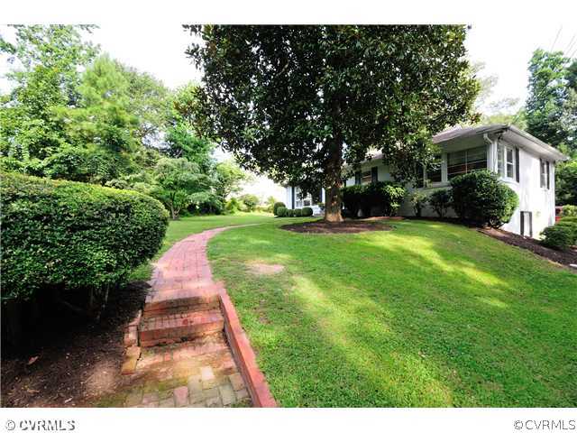 8302 Cherokee Road Richmond, VA 23235 - Photo 3 of 24 Exterior Front - This view of the brick pathway is