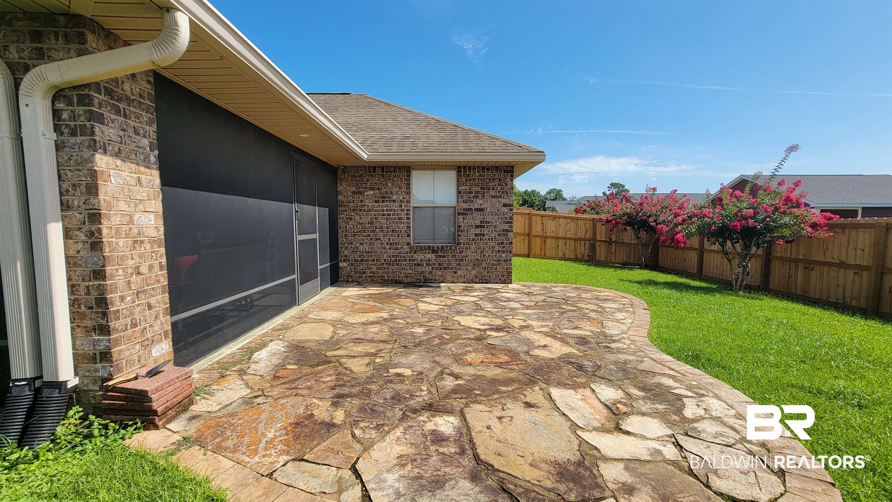 1704 Arcadia Drive Foley, AL 36535 - Photo 40 of 52 Fenced backyard featuring a patio area