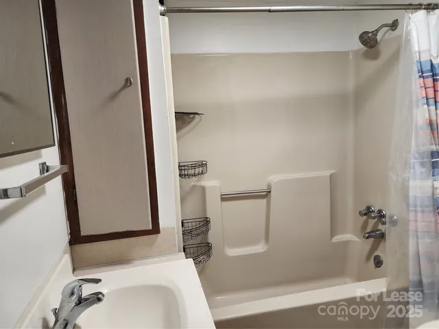 a utility room with cabinets