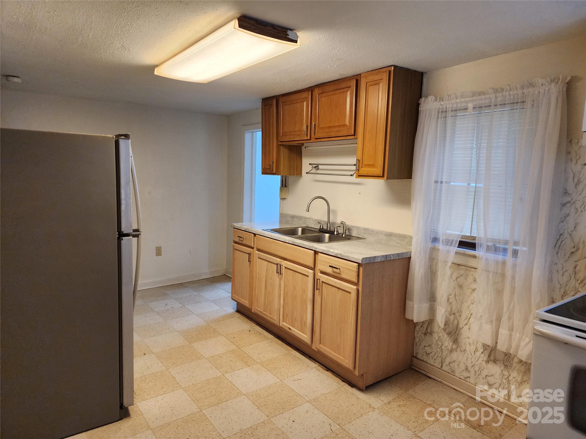 435 Rankin Street Northwest Lenoir, NC 28645 - Photo 9 of 10 a utility room with cabinets