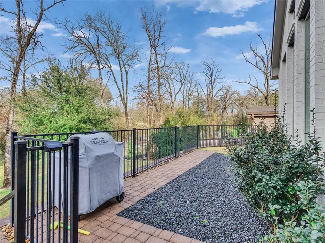 a view of street with small yard