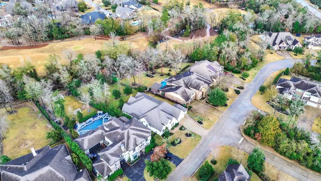 an aerial view of residential house with outdoor space