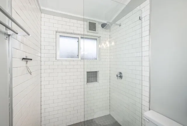 a view of a house with wooden walls