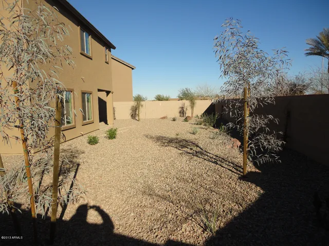 a view of a house with a snow in the yard