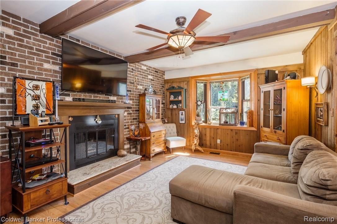 17142 Merriman Road Livonia, MI 48152 - Photo 21 of 48 Family room with gas fireplace