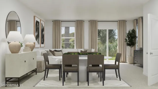 a living room with furniture and large window