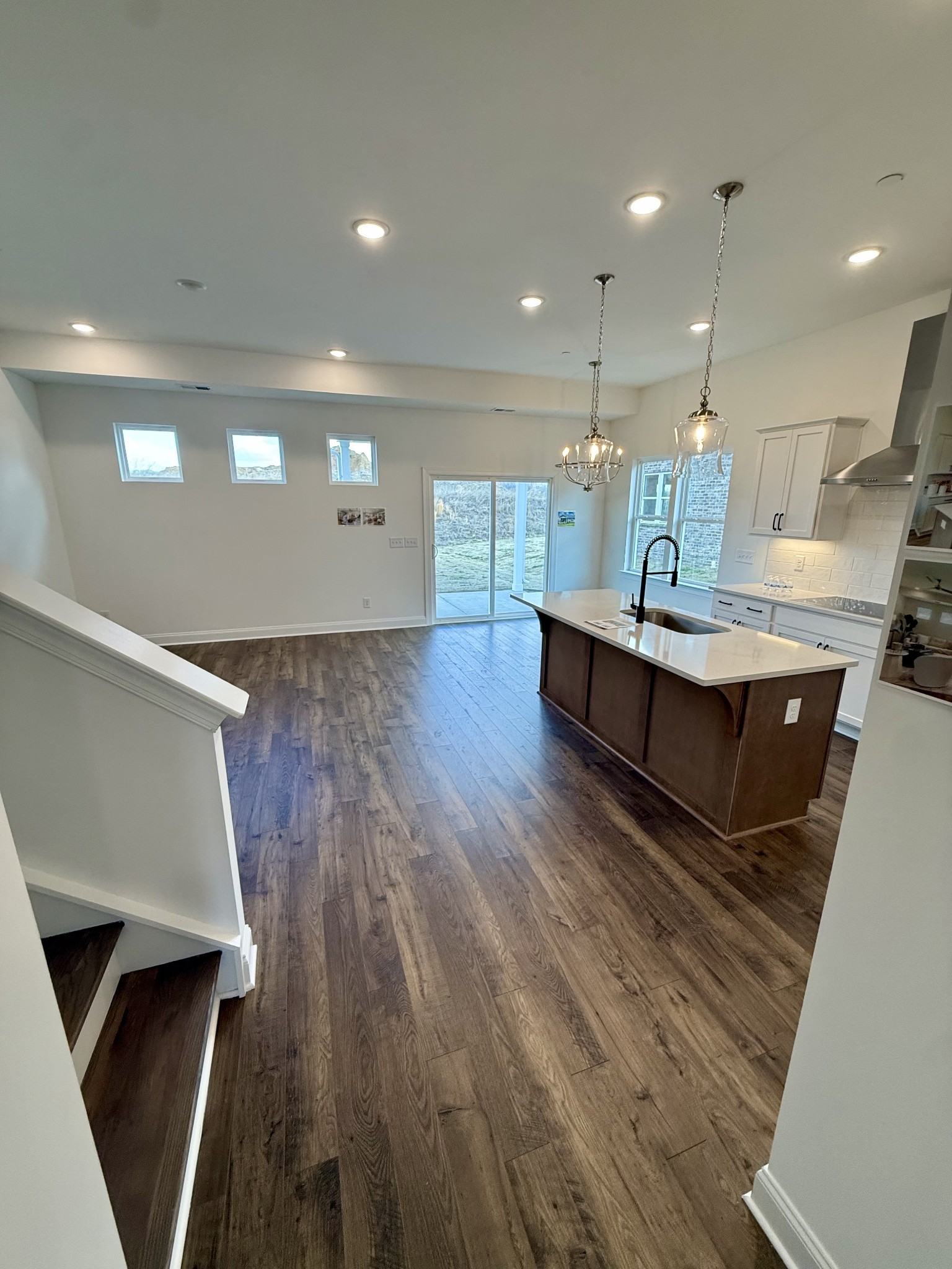 6421 Waymeet Dr Spring Hill Spring Hill, TN 37174 - Photo 2 of 29 a view of kitchen island with furniture and wooden floor
