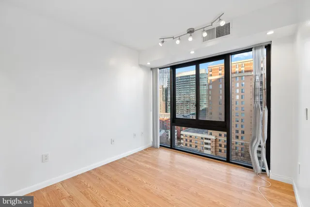 a view of an empty room with a window