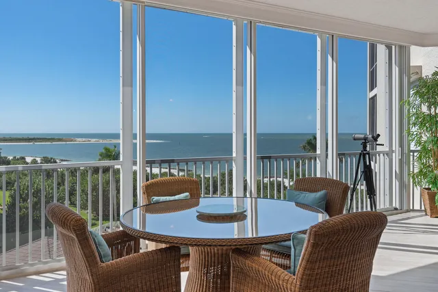 a view of a chair and tables